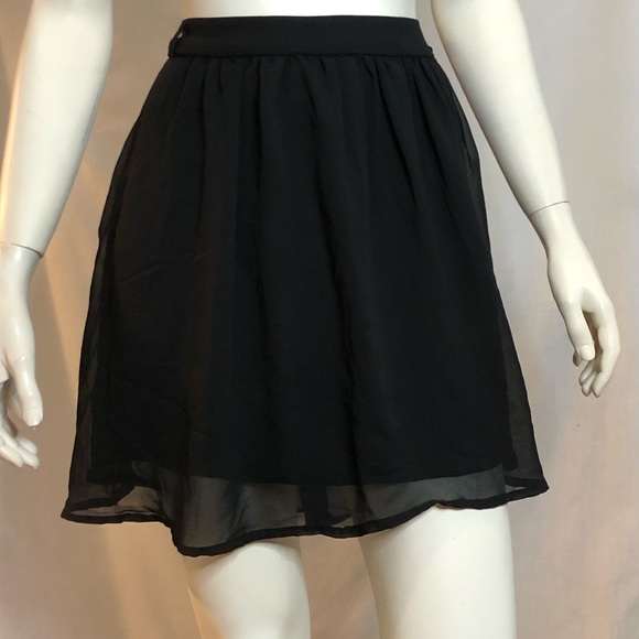 Xhilaration Dresses & Skirts - Woman’s black skater flare mini skirt size medium